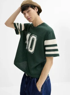 Perforated knit team sweater
