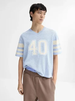 Perforated knit team sweater