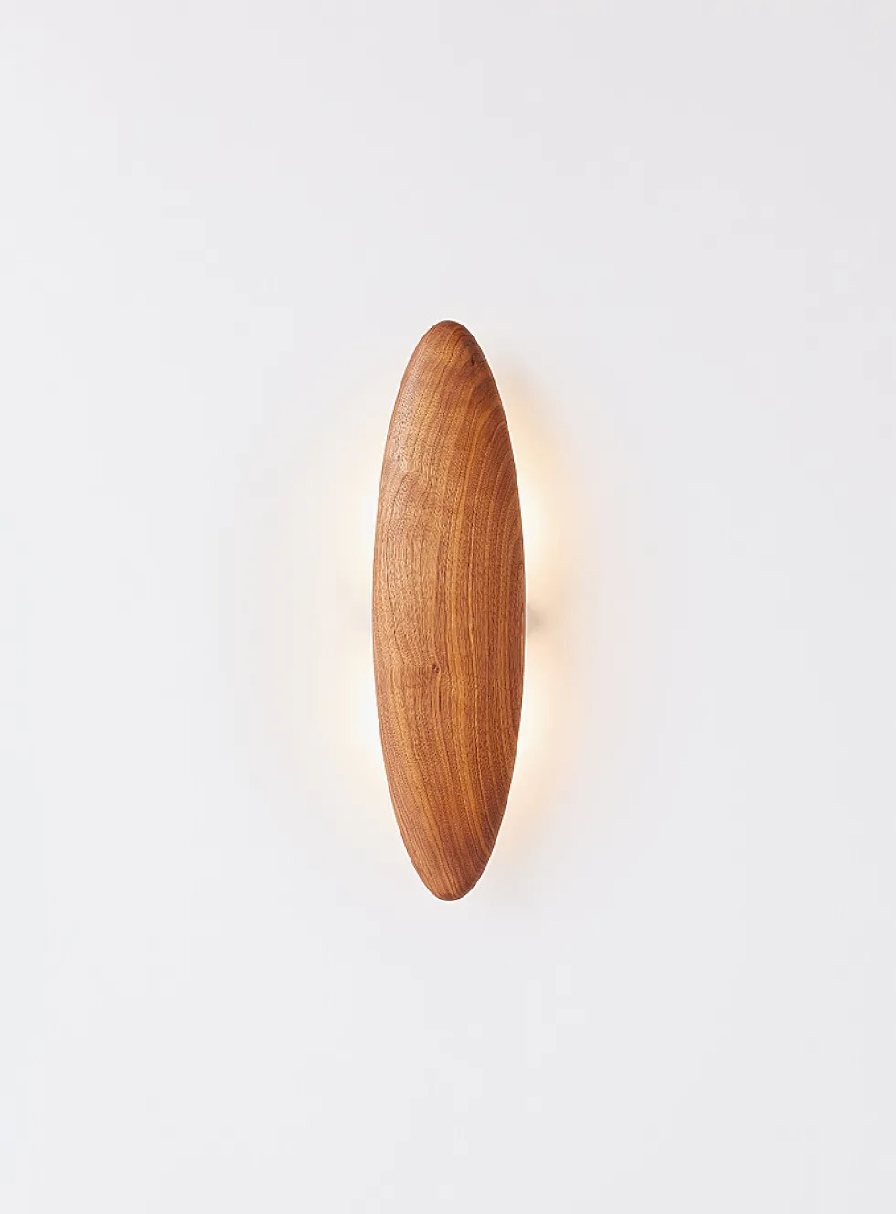 Permanence walnut wall sconce