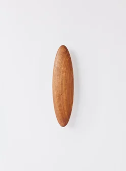Permanence walnut wall sconce