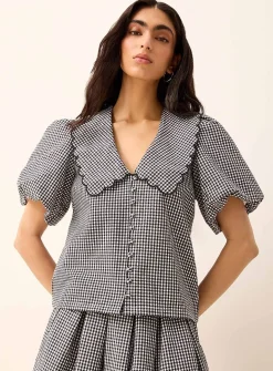 Peter Pan collar balloon-sleeve seersucker blouse