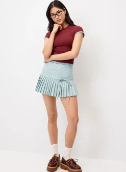 Pin dot pleated miniskirt