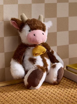 Plush cow with bell