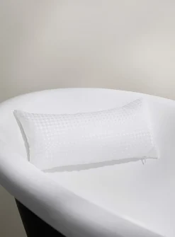 Polka dot bath cushion