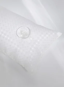 Polka dot bath cushion