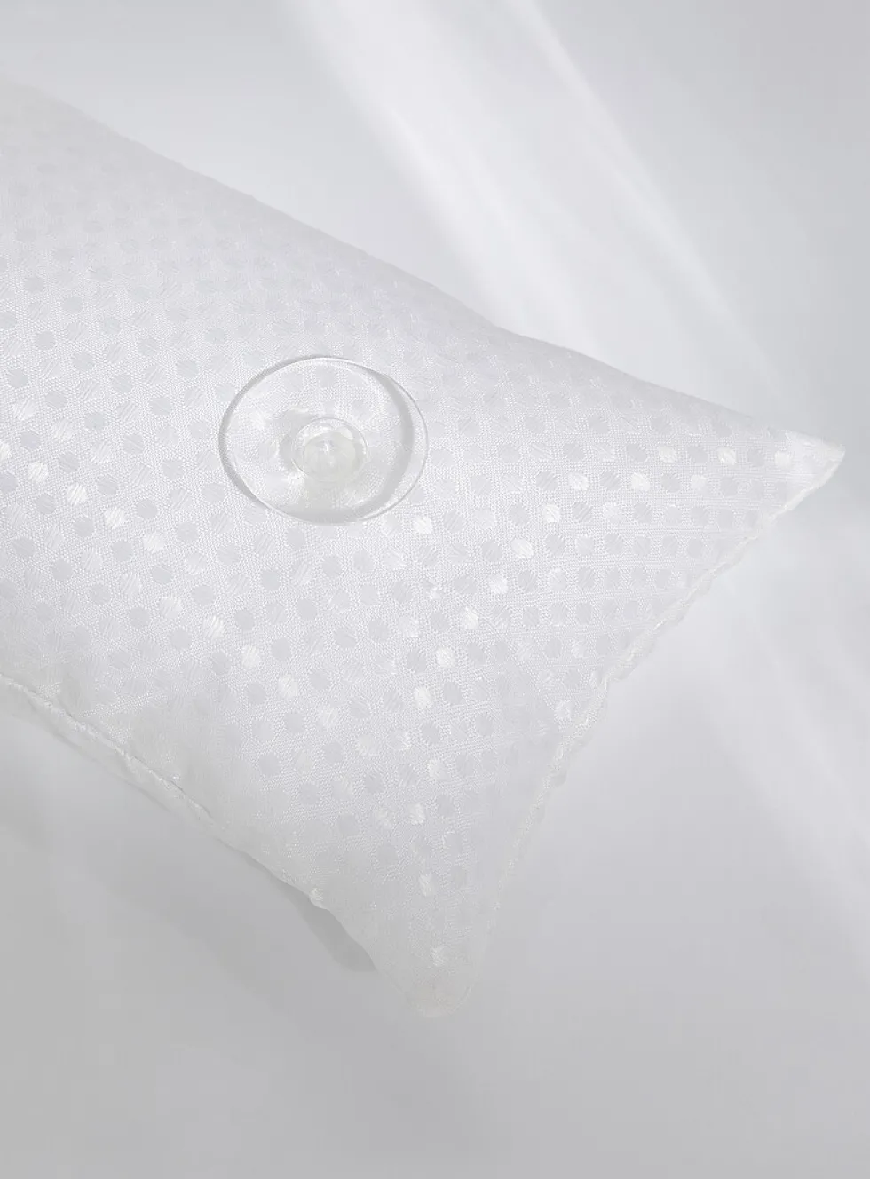 Polka dot bath cushion