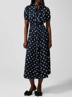 Polka-dotted tie-neck dress