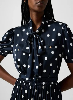 Polka-dotted tie-neck dress