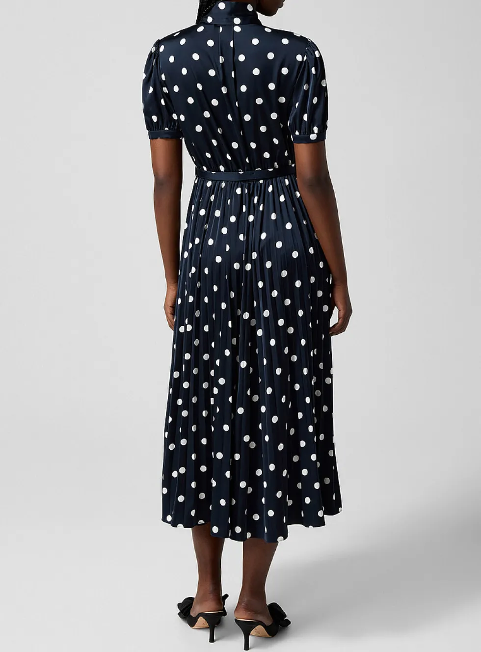 Polka-dotted tie-neck dress