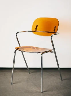 Polycarbonate and metal armrest chairs