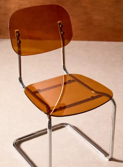Polycarbonate and metal chairs