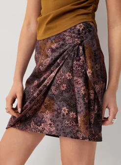Printed side-tie wrap miniskirt