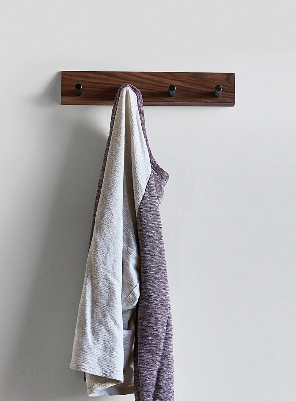 Pyramid four peg hook wall rack