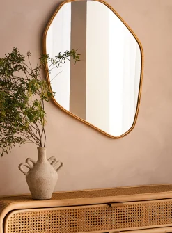 Rattan trim asymmetrical mirror