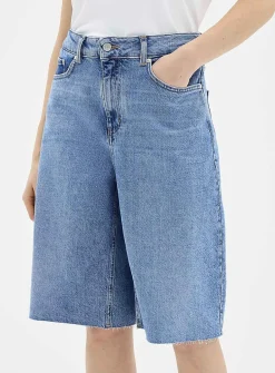 Raw-hem luxurious denim Bermudas