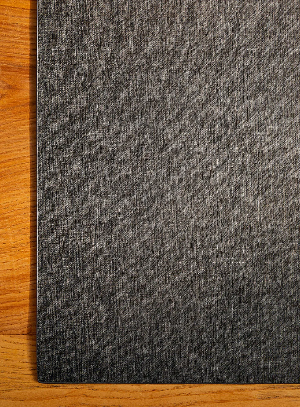 Rectangular heathered faux-leather placemat