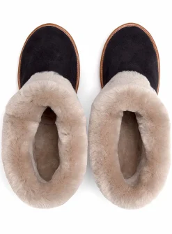 Reversed sheepskin cuffed boots