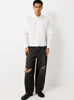 Ripped-knee jean