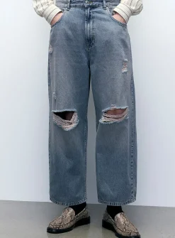 Ripped-knee jean