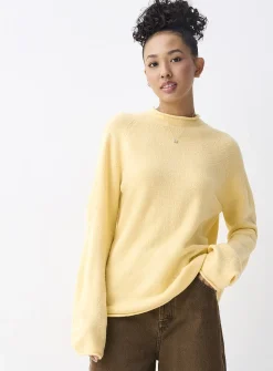 Rolled hem bouclé knit sweater