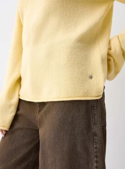 Rolled hem bouclé knit sweater