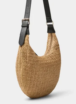 Rounded woven straw hobo bag