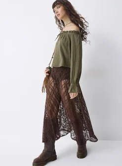 Ruffled off-the-shoulder blouse
