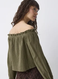 Ruffled off-the-shoulder blouse