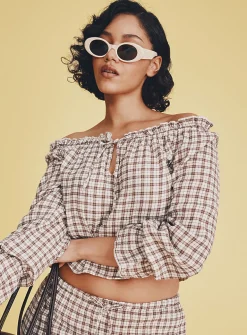 Ruffled off-the-shoulder blouse