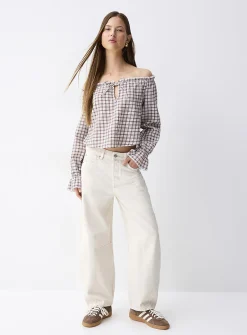 Ruffled off-the-shoulder blouse