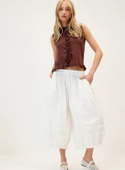 Ruffled trim vest
