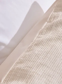Sand-coloured waffled body pillow sham