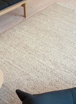 Sandy speckled artisanal rug