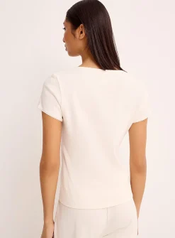 Scalloped edging pointelle knit cardigan