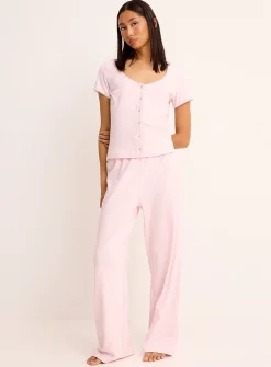 Scalloped edging pointelle knit cardigan