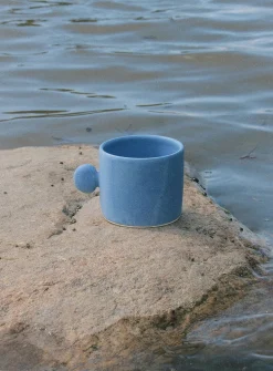 Seashell handle ceramic mug