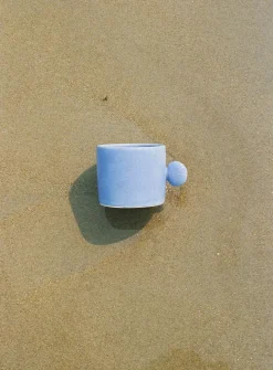 Seashell handle ceramic mug