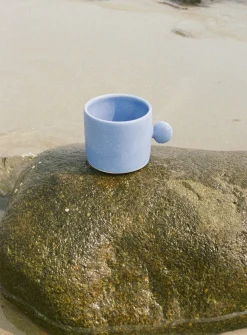 Seashell handle ceramic mug
