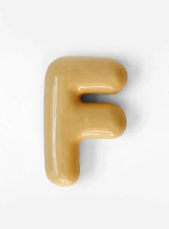 Semiporcelain letter F wall ornament
