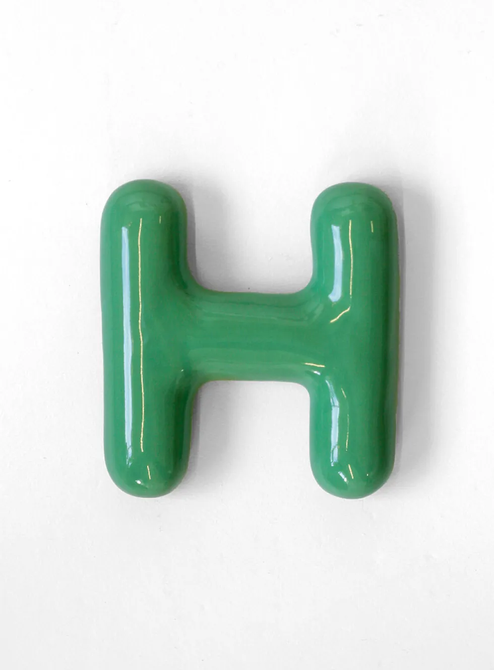 Semiporcelain letter H wall ornament