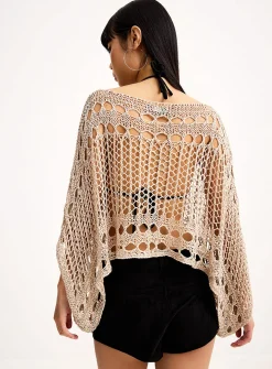 Shimmering openwork poncho