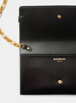 Shuffle strapped leather wallet