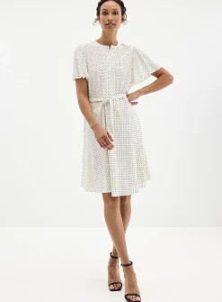 Silky polka dot pleated bib dress