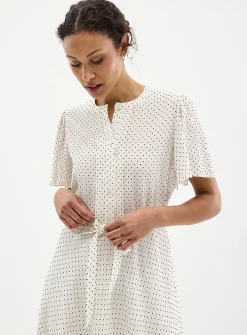 Silky polka dot pleated bib dress