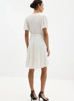 Silky polka dot pleated bib dress