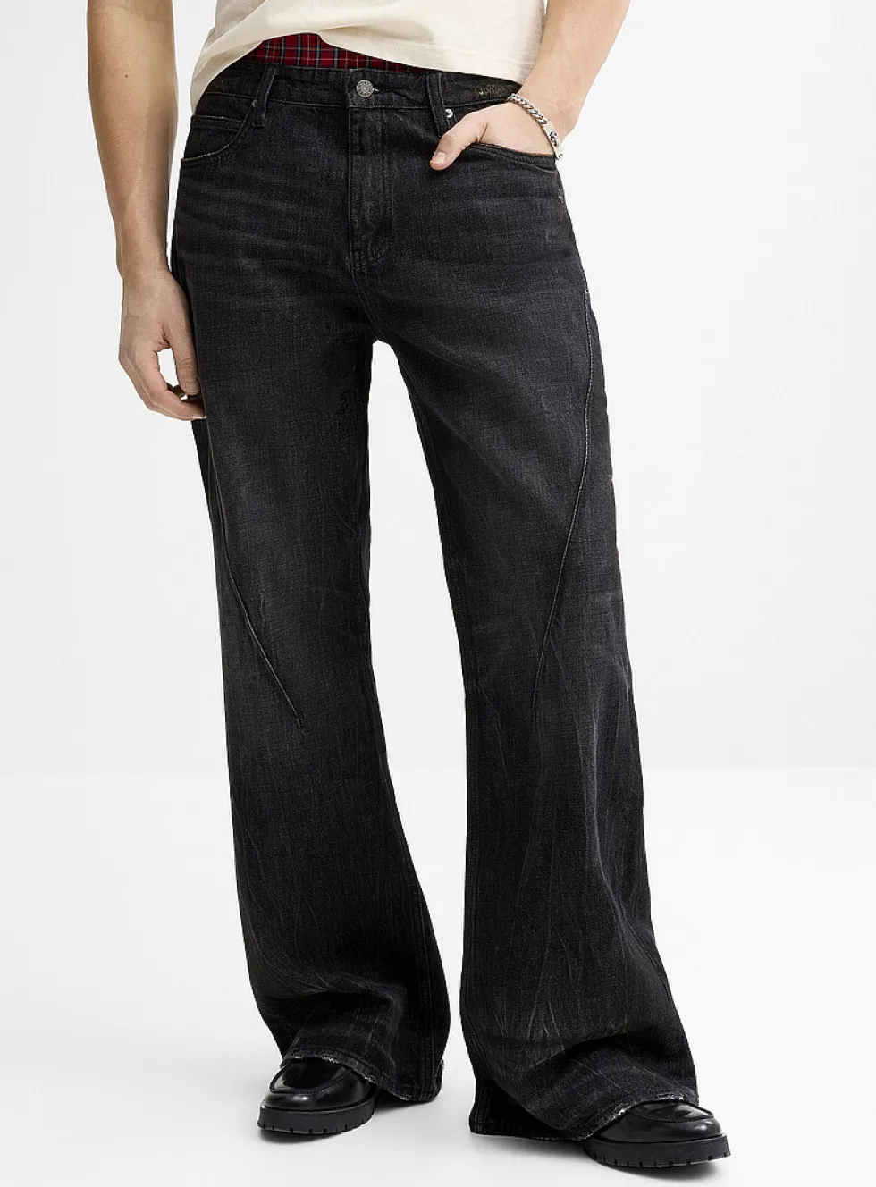 Slanted-seam faded black jean