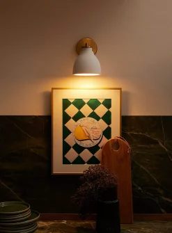 Sleek bell-shaped wall sconce