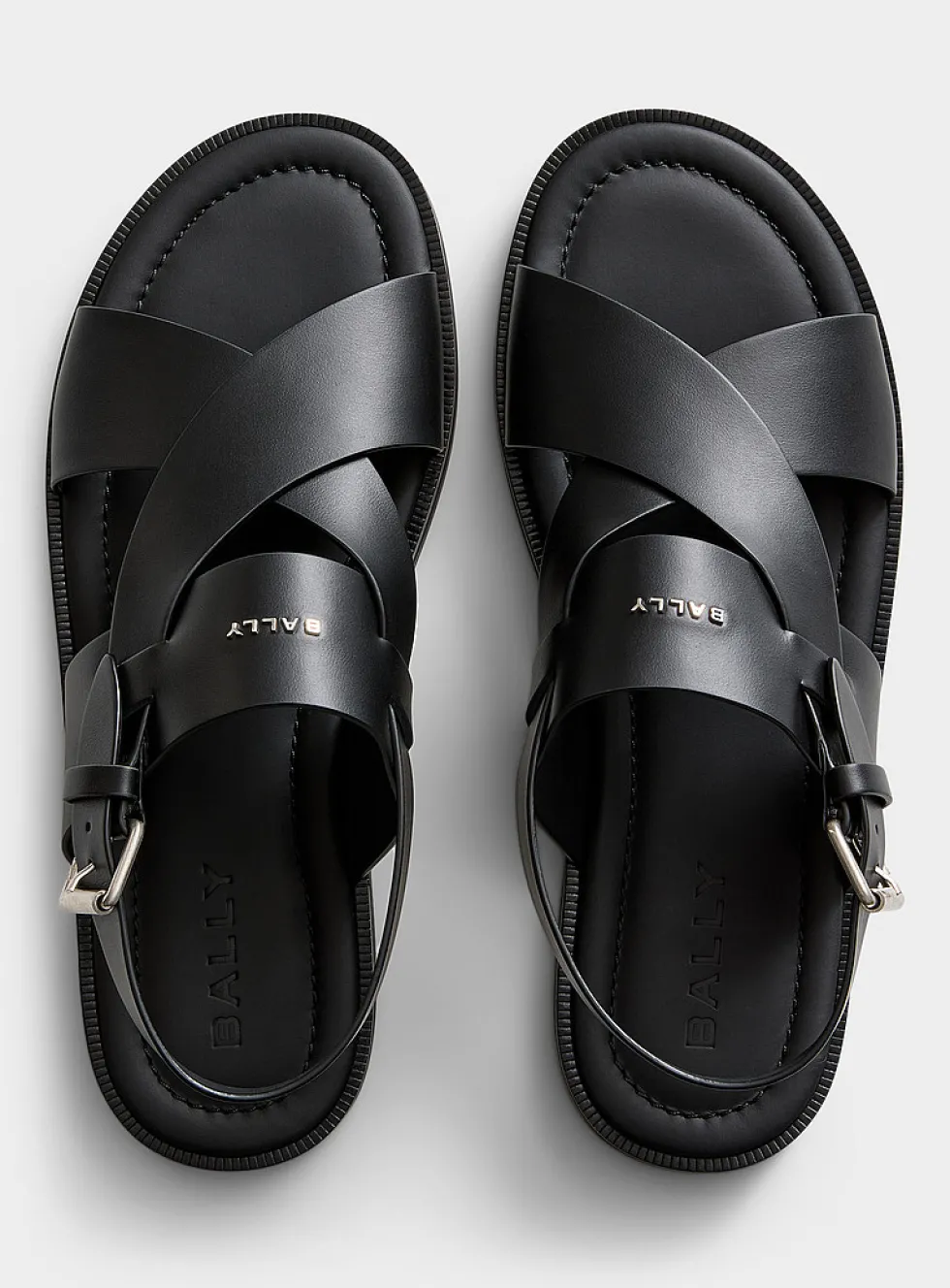 Sleek crossed-strap sandals