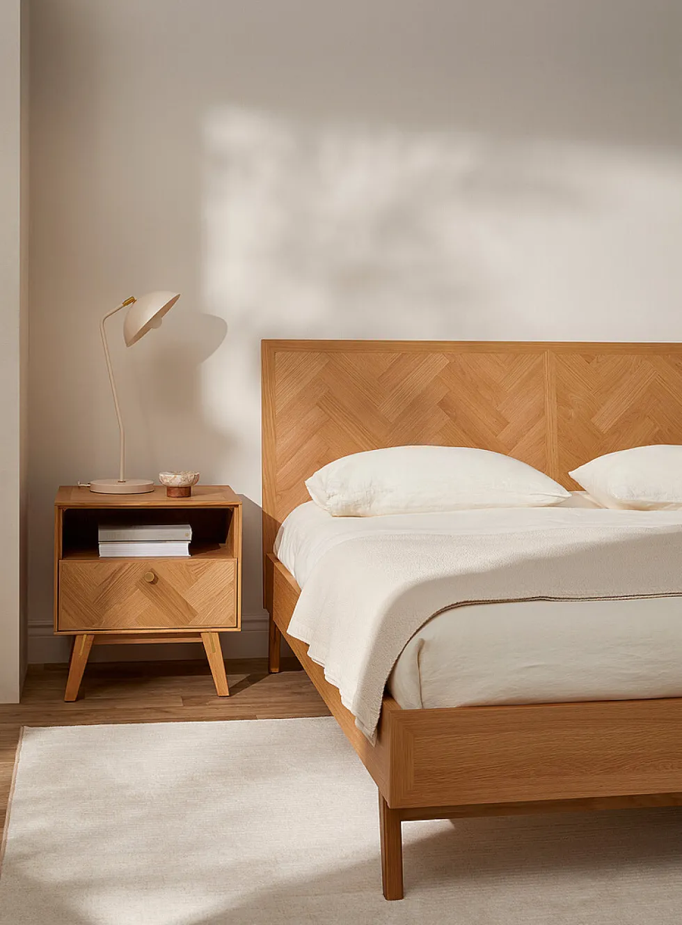 Sleek natural oak bed frame