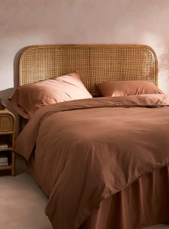 Sleek natural rattan headboard